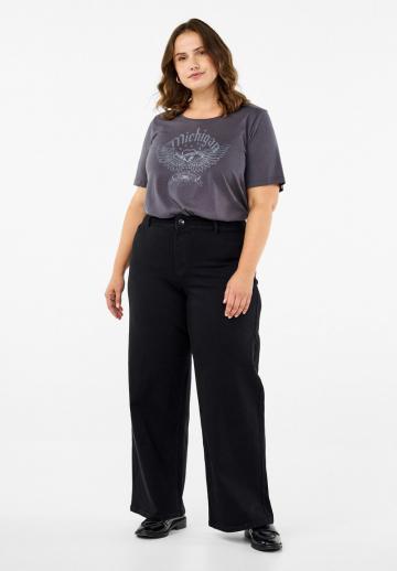 Клешеные джинсы