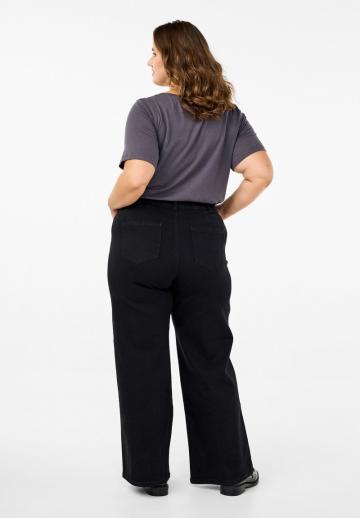 Клешеные джинсы