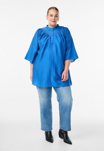 Длинная блузка