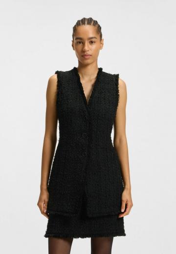 Длинный жилет