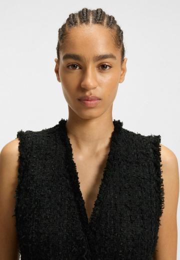 Длинный жилет