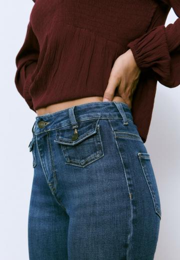 Клешеные джинсы