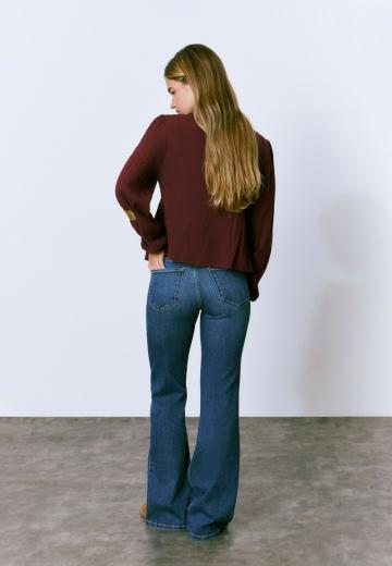 Клешеные джинсы