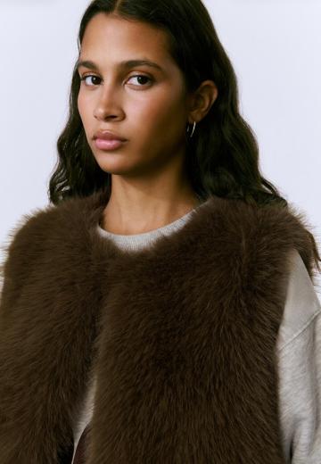 Пуховой жилет