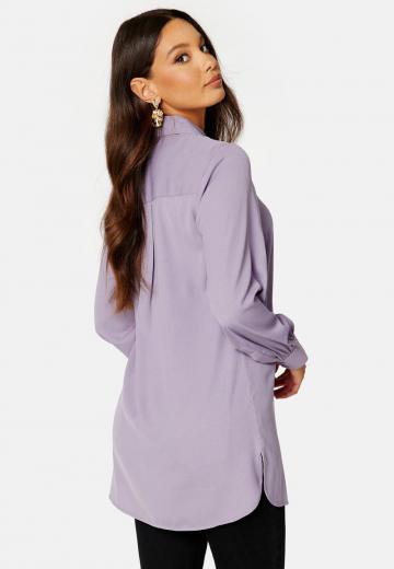 Длинная блузка