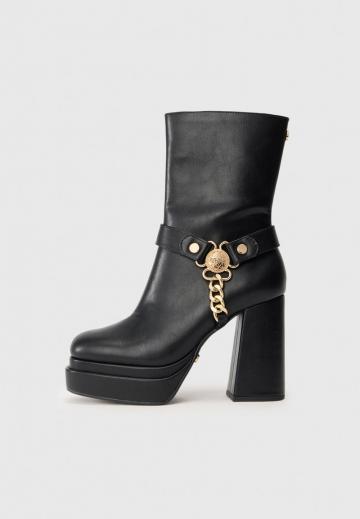 Полусапожки на высоком каблуке