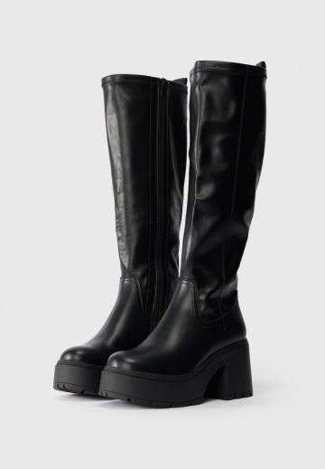Высокие сапоги