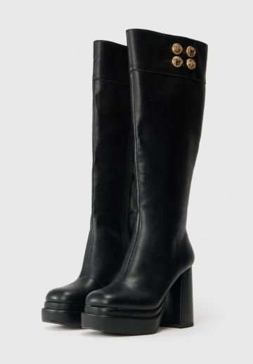 Высокие сапоги