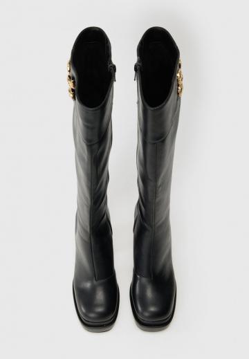 Высокие сапоги