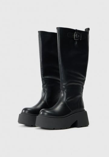 Высокие сапоги