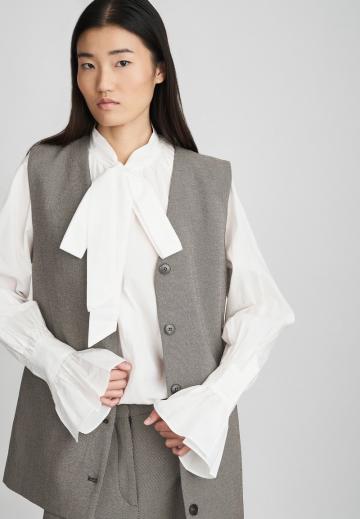 Длинный жилет