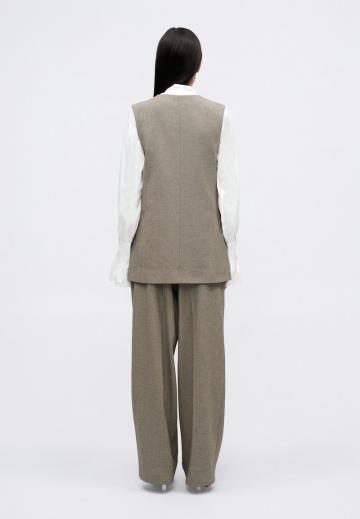 Длинный жилет