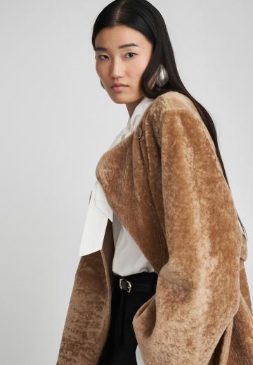 Пальто из искусственной кожи