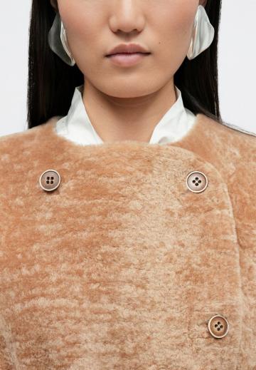 Пальто из искусственной кожи