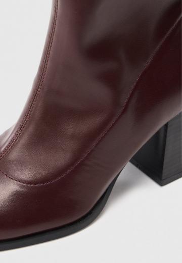 Высокие сапоги