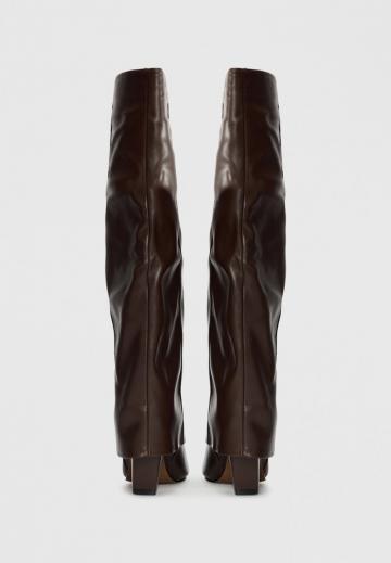 Высокие сапоги