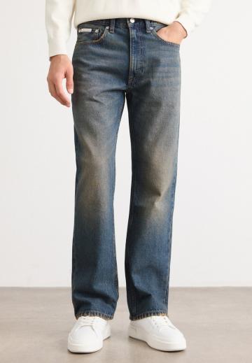 Клешеные джинсы