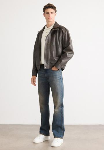 Клешеные джинсы