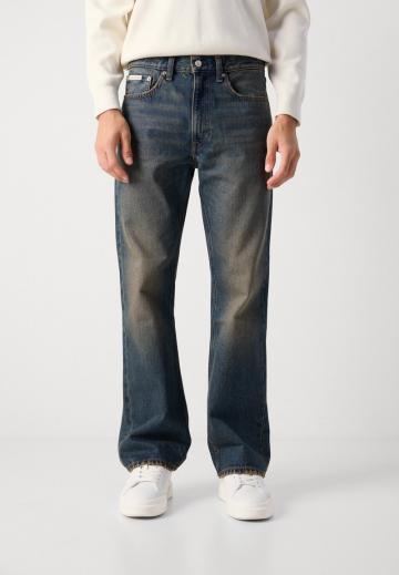 Клешеные джинсы