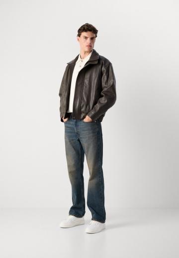 Клешеные джинсы