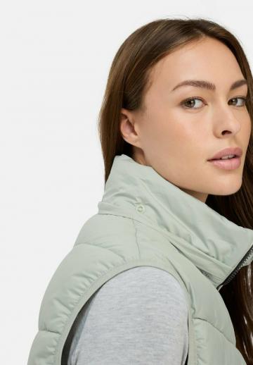 Длинный жилет