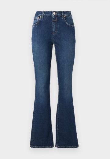 Клешеные джинсы