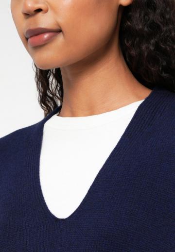 Длинный жилет