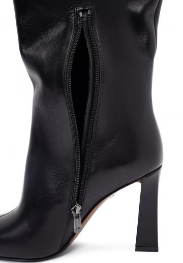 Высокие сапоги