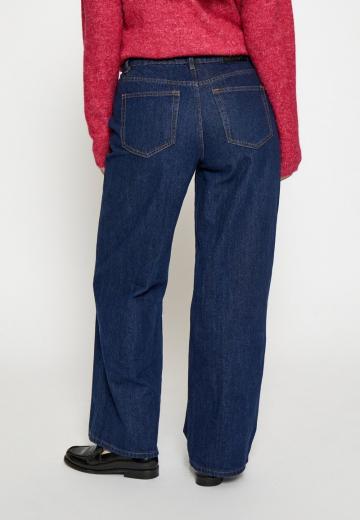 Клешеные джинсы