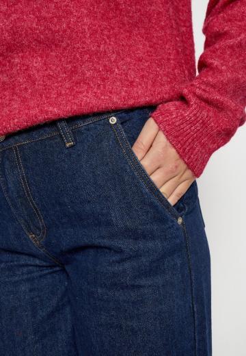 Клешеные джинсы