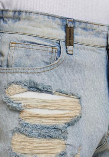 Клешеные джинсы