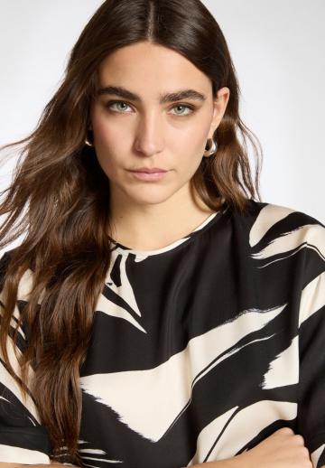 Длинная блузка