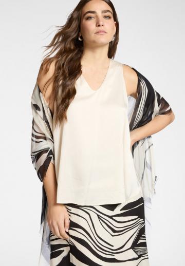 Блузка без рукавов