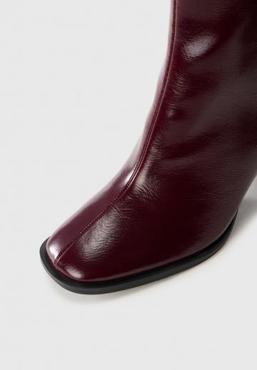 Высокие сапоги