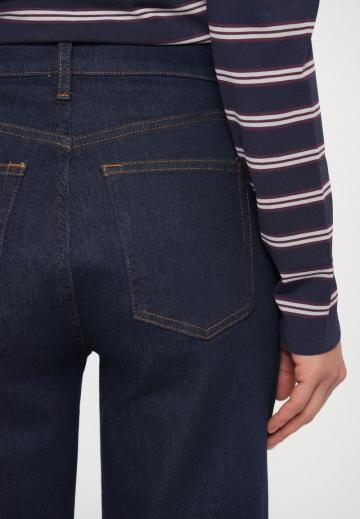 Клешеные джинсы