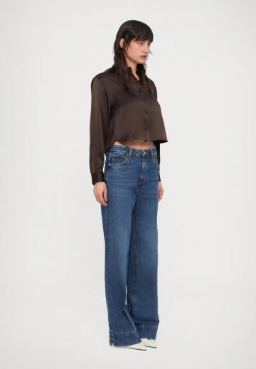 Клешеные джинсы