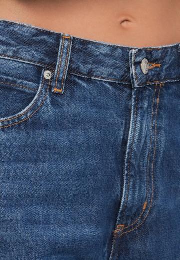 Клешеные джинсы