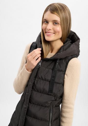 Длинный жилет