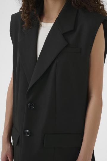 Длинный жилет