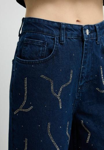 Клешеные джинсы