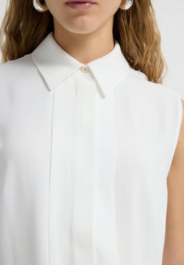 Блузка без рукавов