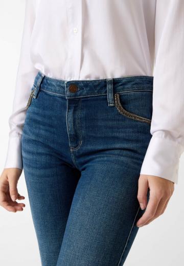 Клешеные джинсы