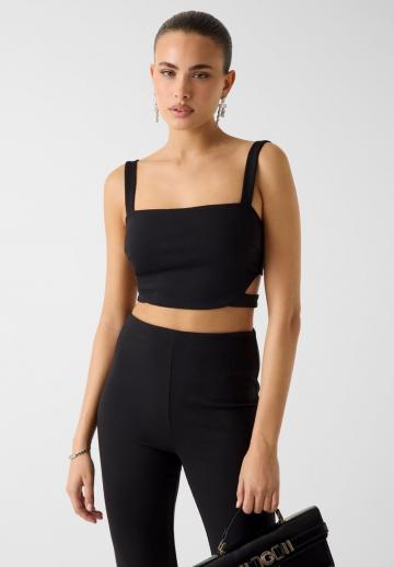 Блузка без рукавов