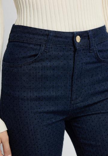 Клешеные джинсы