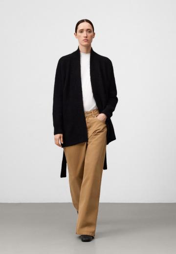 Длинный жилет