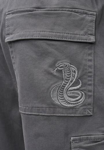 Брюки с накладными карманами