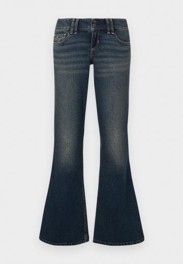 Клешеные джинсы