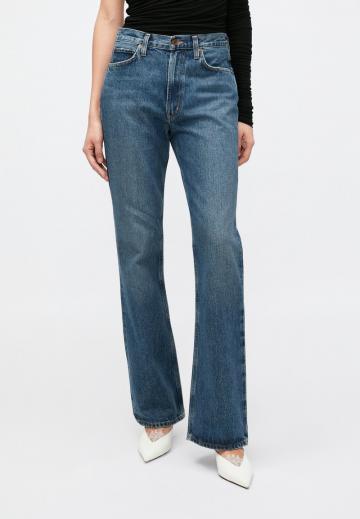 Клешеные джинсы