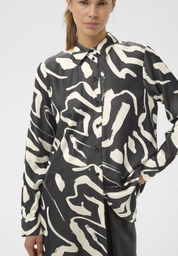 Длинная блузка