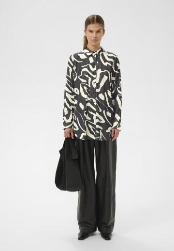 Длинная блузка